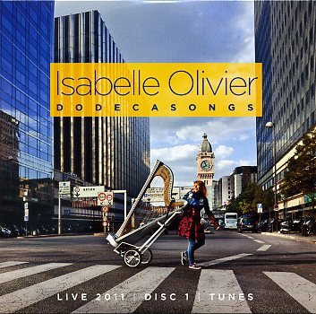 Olivier-Isabelle_Dodecasongs_w007.jpg - Isabelle OLIVIER  : " Dodecasongs"20 ans de scène !  Ça se fête ! La harpiste Isabelle Olivier a choisi de célébrer cet événement en réunissant ses amis, sur diverses scènes européennes au fil des mois de l'année passée. Musicienne brillante, jazz-woman inventive et ouverte aux rencontres, elle présente son travail dans un double album, un disque consacré aux versions instrumentales de 13 thèmes originaux repris en version chantée sur le second. Un beau panorama de l'univers d'Isabelle Olivier... un peu trop "catalogue" à nos oreilles mais le chois est intéressant et assumé sans failles ni faiblesses.> ENJA - ENJA 97182 (2 CD) / Harmonia MundiIsabelle Olivier : harpe  / Beñat Achiary : chant / Michel Bénita : contrebasse / David Binney : saxophone / Marc Buronfosse : contrebasse / Catherine Delaunay : clarinette et cor de basset / Tam de Villiers : guitare / Peter Erskine : batterie / Brigitte Jacquot : chant / David Linx : chant / Didier Lockwood : violon / Fabrice Moreau : batterie / Louis Moutin : batterie / Monica Passos : chant / Joe Quitzke : batterie / Johan Renard : violon / Olivier Sens : ordinateur / Sébastien Texier : sax et clarinette / David Venitucci : accordéon / Norma Winstone : chant / Jacques Dor : comédien et auteur / etc.CD 1 : instrumental du solo au big band : 13 titres / CD 2 : vocal : 13 titreswww.isabelleolivier.com | http://www.enjarecords.com