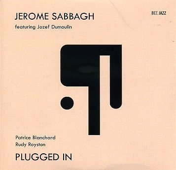 Sabbagh-Jerome_Plugged-In_w029.jpg - Jérôme SABBAGH : "Plugged In"Jérôme Sabbagh a mis les doigts dans la prise ! Le voilà tout électrisé... Rassurez-vous, son saxophone ténor a gardé son timbre naturel, son phrasé fluide et chantant, sa rondeur féline. La rythmique est resté souple et swinguante même si la basse est électrique. C'est du côté du pianiste belge Jozef Dumoulin que le son prend une couleur plus électrique mais ce musicien est un remarquable spécialiste des technologies avancées dont il sait tirer une matière très personnelle qui apporte une nouvelle dimension au projet du leader.Sabbagh toujours lui-même mais différent... Nous ne serons pas déroutés bien au contraire. Branchez-vous !> Bee Jazz - BEEO49 / Abeille MusiqueJérôme Sabbagh : saxophone ténor /Jozef Dumoulin : Rhodes fender / Patrice Blanchard : Basse électrique / Rudy Royston : batterie01. drive / 02. Spécial K / 03. Aisha / 04. Jeli / 05. Ronny / 06. walk 6 / 07. UR / 08. Minor / 09. Rider / 10. Boulevard Carnot / 11. City dawn / 12. Walk 3 bis / 13. Kasbah / 14. Slow rock balladwww.jeromesabbagh.com  | www.jozefdumoulin.com | http://www.beejazz.com/