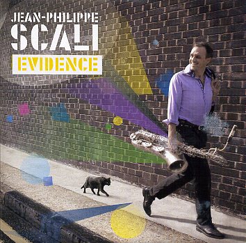 Scali-Philippe_Evidence_w014.jpg - Jean-Philippe SCALI : "Evidence"La photo de la pochette colle bien au contenu de ce disque. On y écoute avec grand plaisir du jazz félin et racé (comme un chat noir aux yeux perçants), les couleurs sont assez chatoyantes pour suggérer la vitalité de l'ensemble et le saxophoniste avance d'un bon pas, droit devant, sourire aux lèvres. Cette musique ne fait pas du sur-place ! En plus, il porte un saxophone baryton dont il se sert avec beaucoup d'aplomb et de musicalité. Une somme d'éléments qui suggèrent une impression positive que confirme l'écoute du disque.Jean-Philippe Scali a réuni essentiellement un sextet pour lequel il a composé six originaux et arrangé l'ensemble en puisant dans des classiques du répertoire, chez Mingus, Monk, Ellington et même le traditionnel "When the Saints..." !Entouré d'une belle équipe d'excellents musiciens, le saxophoniste originaire de Draguignan (Dragui's Mood) réussit là un disque sans surprises mais pas sans qualités.Gaya Music Production JPSGCD001 / Abeille MusiqueJean-Philippe Scali : saxophones & compositions (sauf 3, 6, 7, 8 et 9) / Julien Alour : trompette & bugle / Jerry Edwards : trombone / Adrien Chicot : piano & Fender Rhodes / Simon Tailleu : contrebasse / Manu Franchi : batterie /+/ invités sur 3 et 4 -> Stephan Carracci : vibraphone / Bastien Ballaz : trombone / François Théberge : saxophone ténor / Thomas Savy : clarinette basse - Direction artistique : Eric Legnini / Mixage : Christophe Dal Sasso et JP Scali01. Brother James / 02. Autoportrait d'un chat sauvage / 03. Fables of Faubus / 04. Eternel Présent / 05. Five minutes walk' / 06. Come Sunday / 07. Evidence / 08. When The Saints Go Marching In (Part I) / 09. When The Saints Go Marching In (Part II) / 10. Hope / 11. Dragui's Mood - enregistré à Paris en avril 2011http://www.abeillemusique.com/CD/Jazz-Blues/JPSGCD001/3760002131900/Gaya-Music-Production/Jean-Philippe-Scali/Evidence/cleart-57374.html | http://www.myspace.com/jpscali